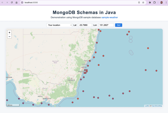 A web application showing a map of Australia with red temperature markers, featuring coordinate input fields and titled "MongoDB Schemas in Java" demonstrating weather data visualization. A web application showing a map of Australia with red temperature markers, featuring coordinate input fields and titled "MongoDB Schemas in Java" demonstrating weather data visualization.